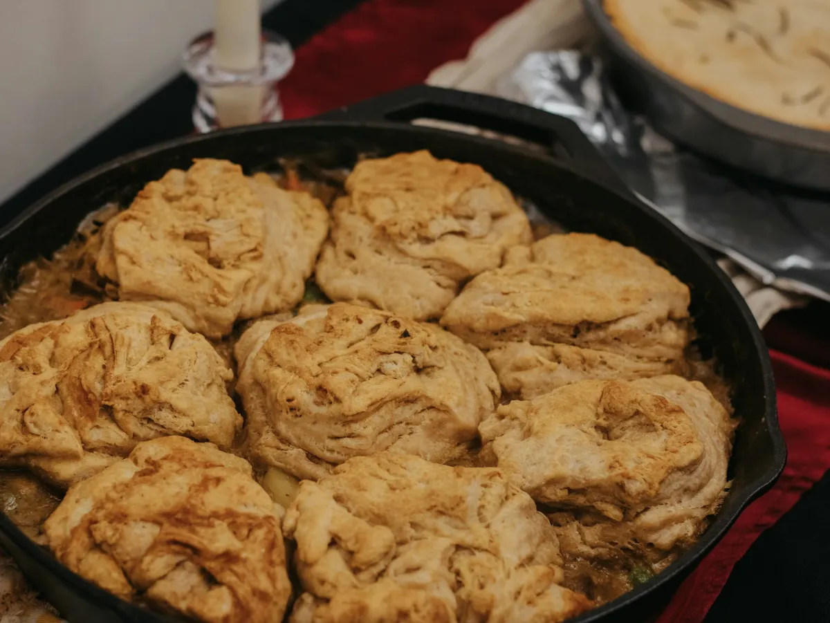 Golden biscuits baked in a cast-iron skillet